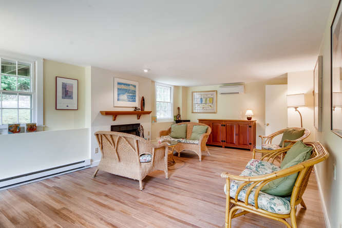 345 N Road Chilmark, MA 02535 - Photo 9 of 26 a living room with furniture window and wooden floor