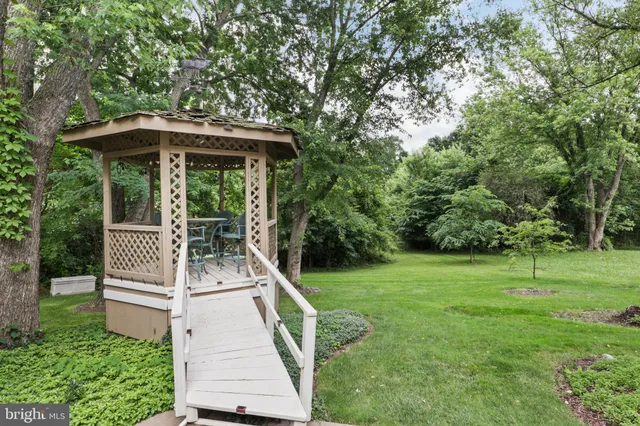 a view of a deck with a yard