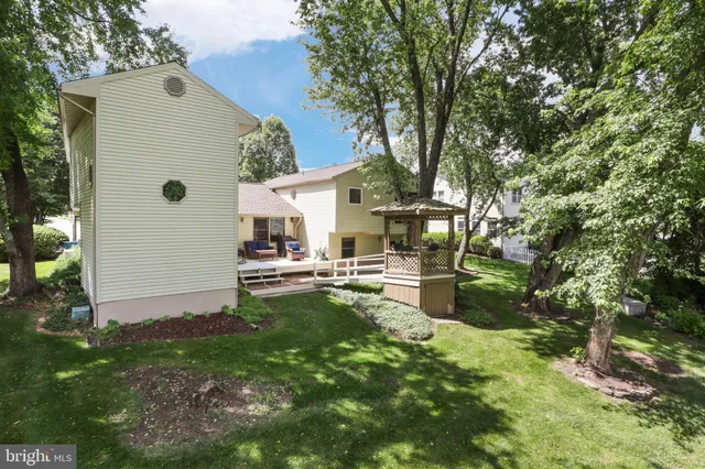 a view of swimming pool with a patio