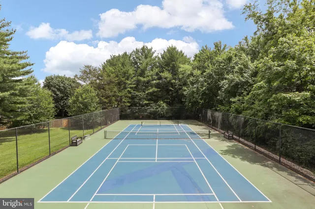 an outdoor space with furniture and garden