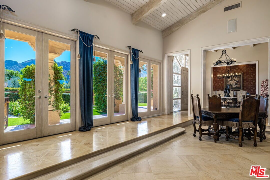 71150 North Thunderbird Terrace Rancho Mirage, CA 92270 - Photo 27 of 75 a view of a dining room with furniture window and outside view