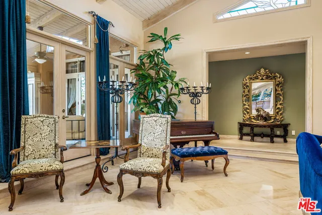 a kitchen with stainless steel appliances granite countertop a sink a oven and cabinets