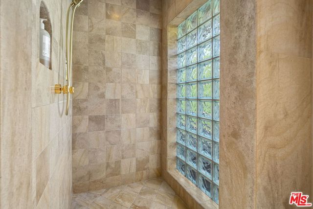 a view of a park with a large tree