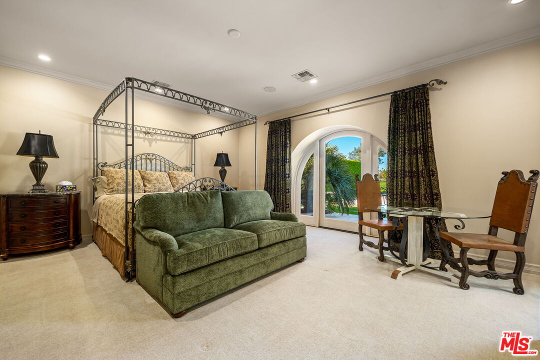 71150 North Thunderbird Terrace Rancho Mirage, CA 92270 - Photo 58 of 75 a living room with furniture