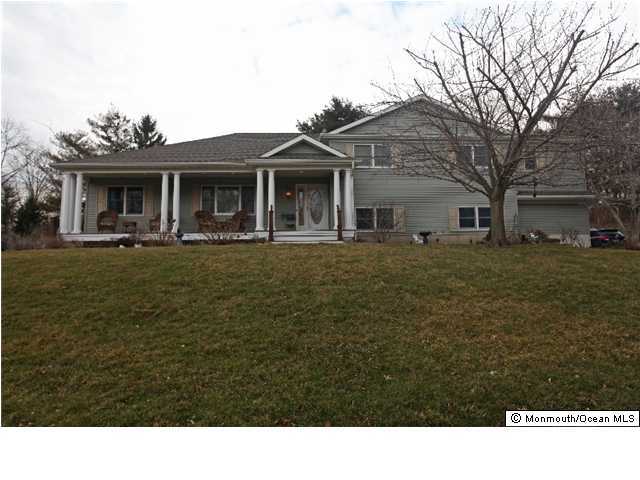 28 Ravine Road Middletown, NJ 07701 - Photo 1 of 3 a black and white photo of a house