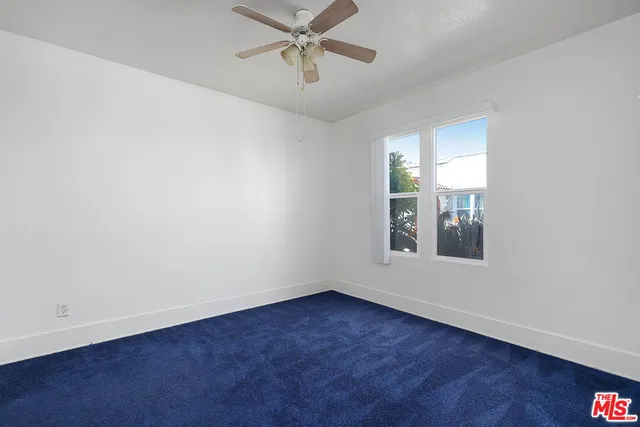 a bathroom with a sink a vanity and a bathtub