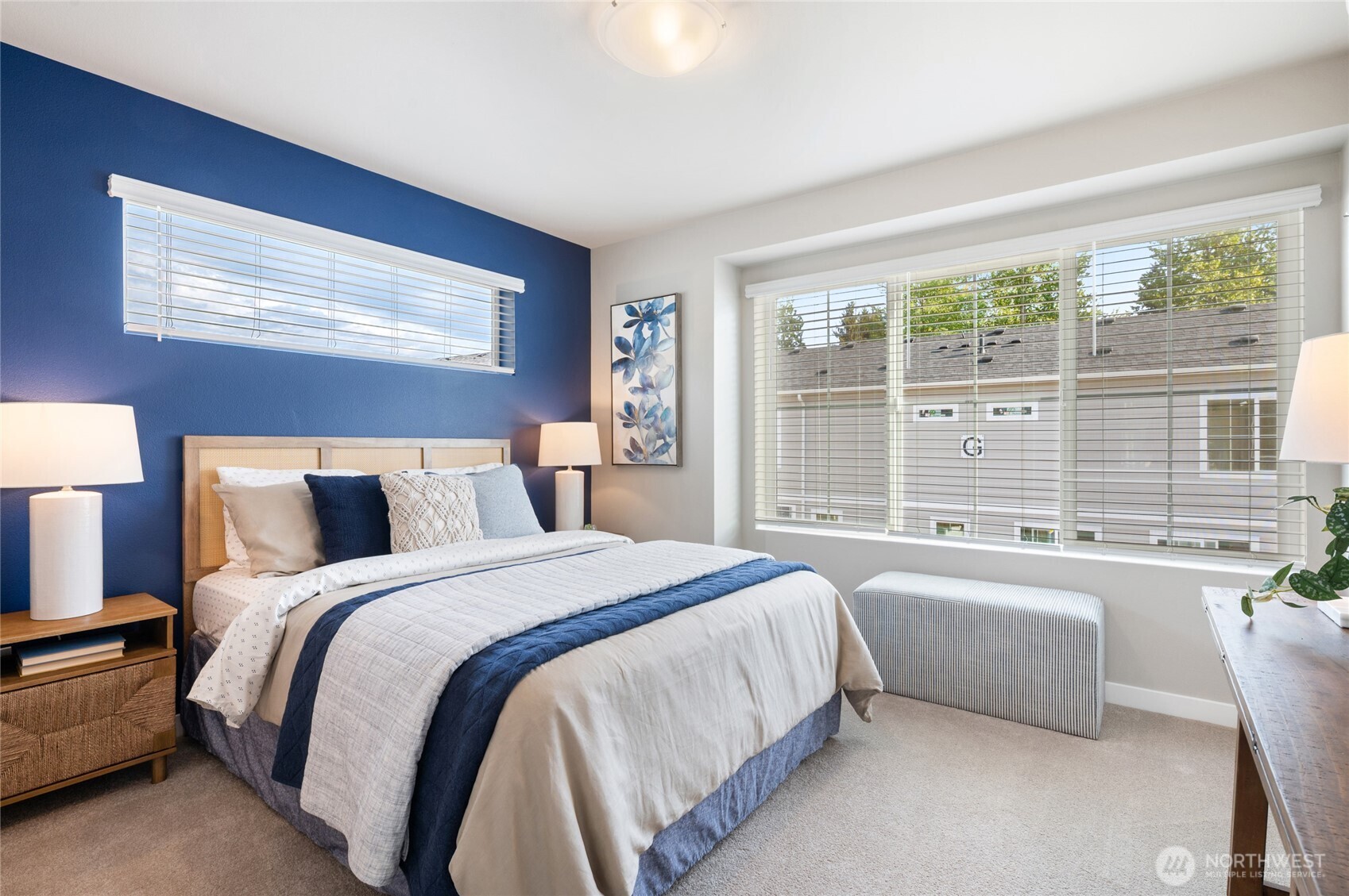 1322 194th Street Southeast, Unit D5 Bothell, WA 98012 - Photo 9 of 13 a bedroom with a bed and a large window