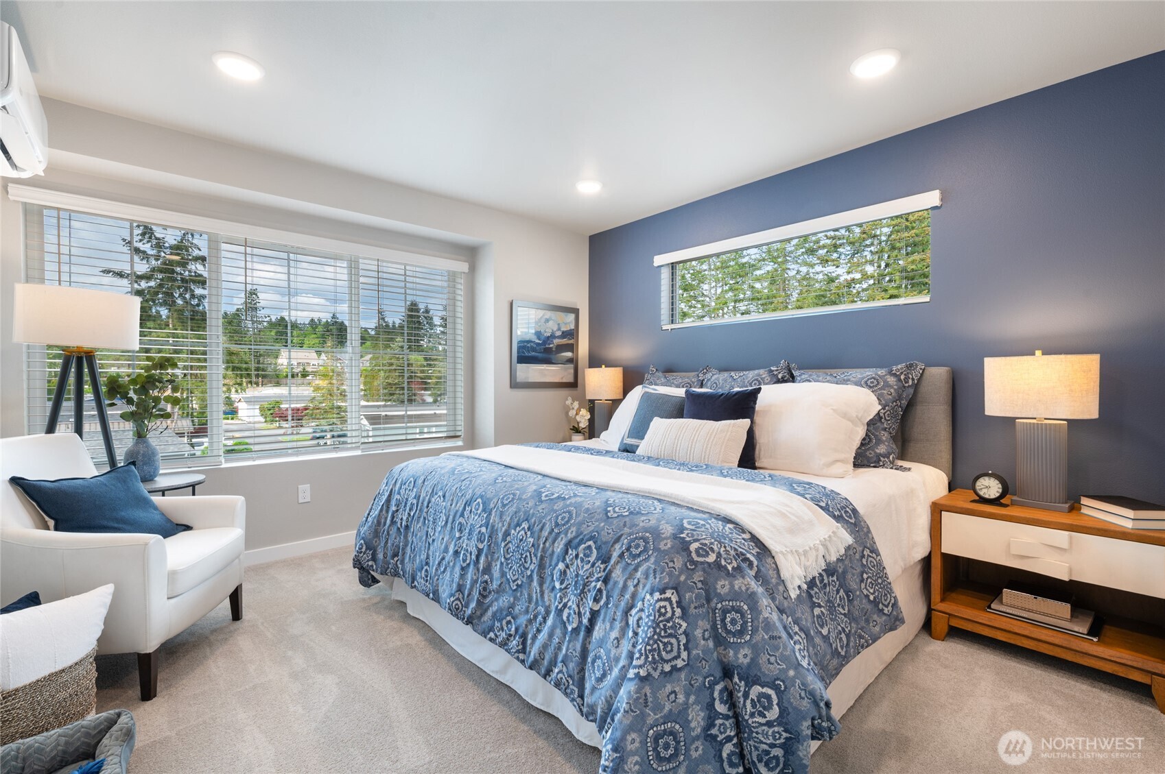 1322 194th Street Southeast, Unit D5 Bothell, WA 98012 - Photo 10 of 13 a bed room with a bed and a couch