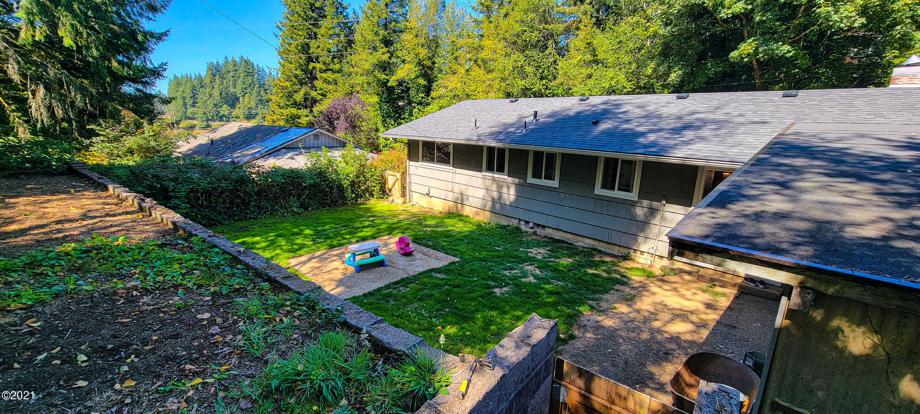 1449 Southeast Ammon Road Toledo, OR 97391 - Photo 28 of 32 Backyard Upper Tier