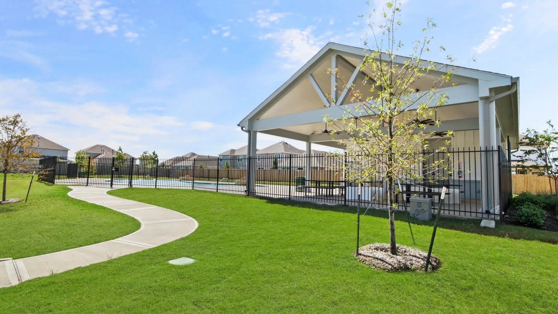 2257 Onyx Lane Conroe, TX 77301 - Photo 18 of 19 a view of a big yard with a swimming pool