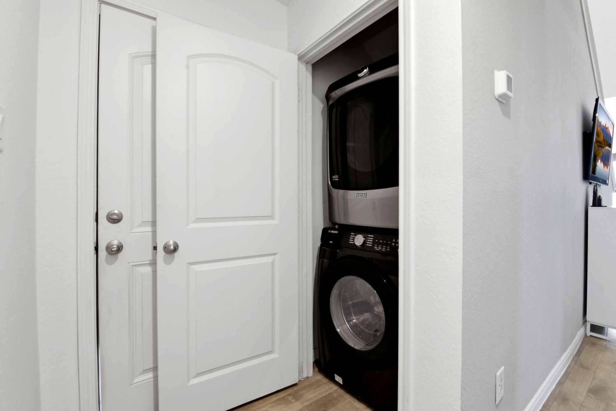 9819 Emerald Stone Way Conroe, TX 77306 - Photo 25 of 38 a view of washer and dryer