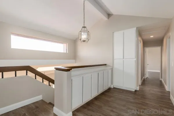 a kitchen that has a lot of cabinets in it
