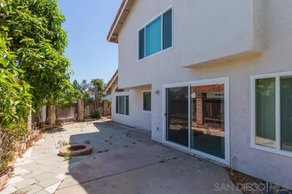 front view of a house with a patio