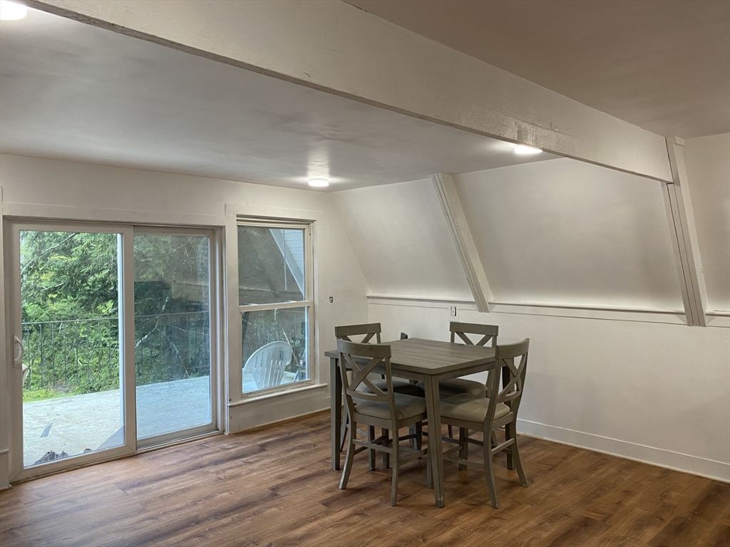 296 River Road Leyden, MA 01337 - Photo 5 of 25 a view of a dining room with furniture and wooden floor