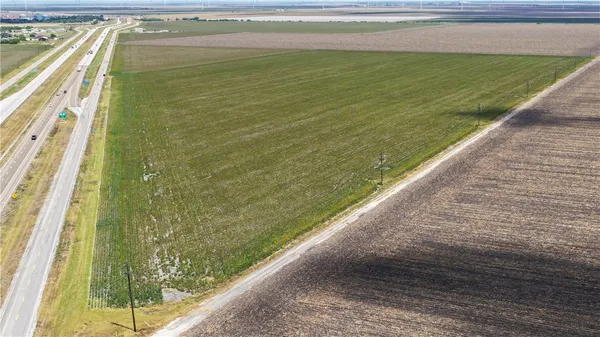 a view of beach and swimming pool