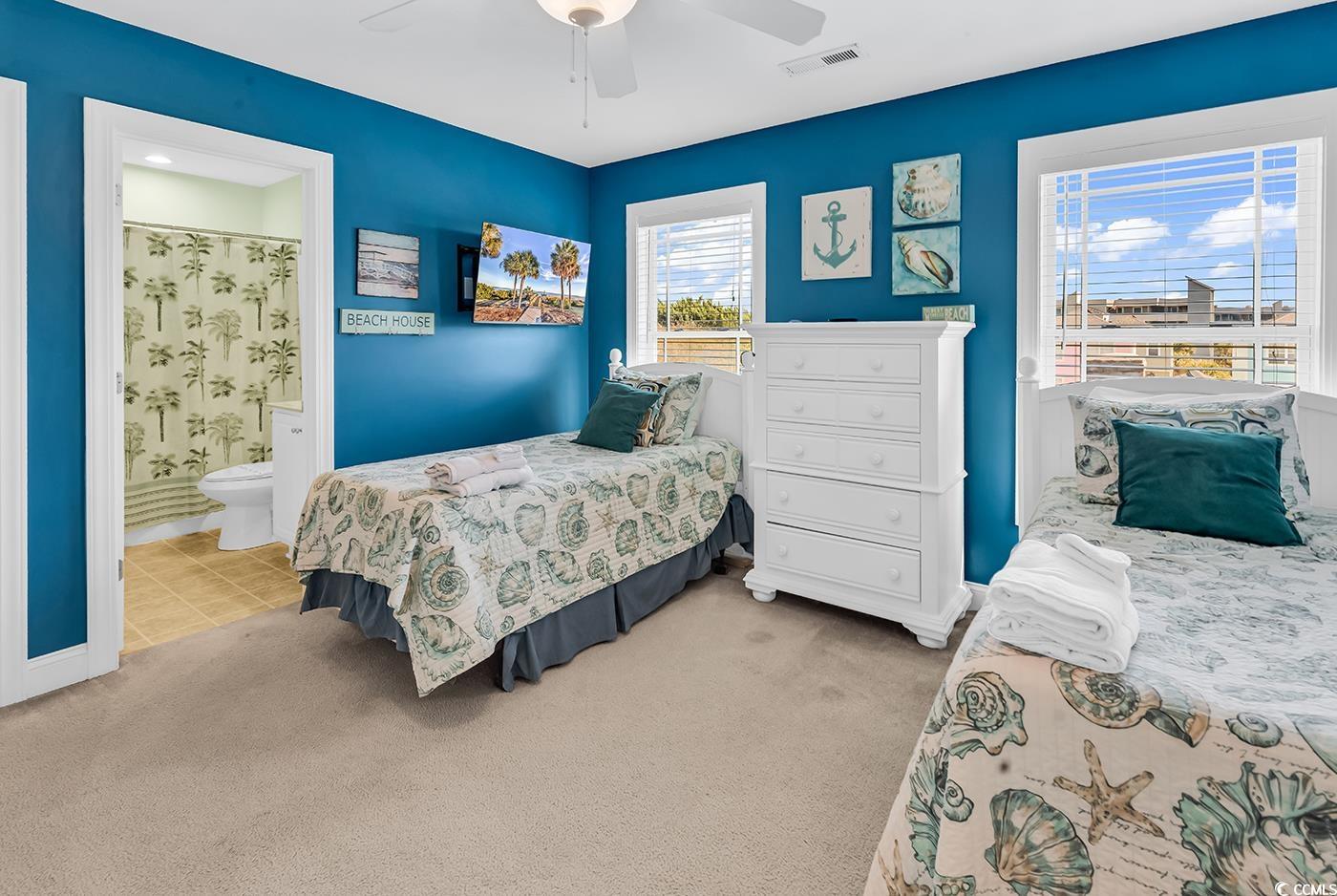 124 B Vista Drive Murrells Inlet, SC 29576 - Photo 26 of 38 Carpeted bedroom featuring a ceiling fan and ensuite bathroom