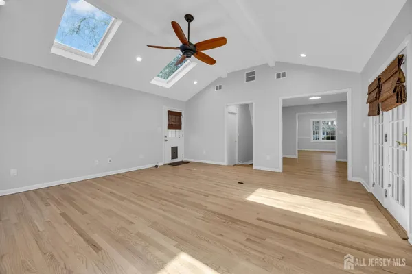 a kitchen with stainless steel appliances kitchen island wooden cabinets and granite counter tops