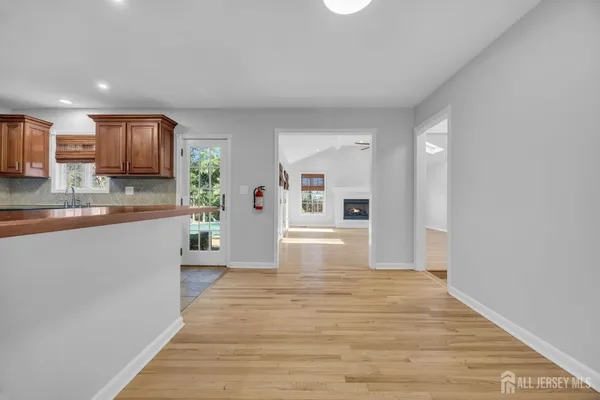 a kitchen with stainless steel appliances granite countertop a sink and cabinets