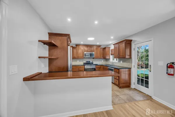 a view of kitchen and utility room