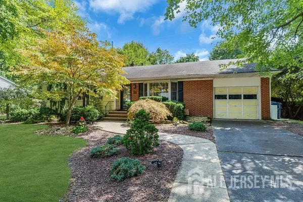 a sign board with a yard