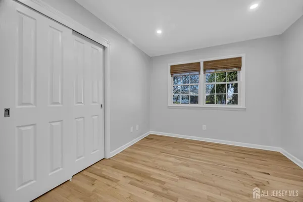 a utility room with sink dryer and washer
