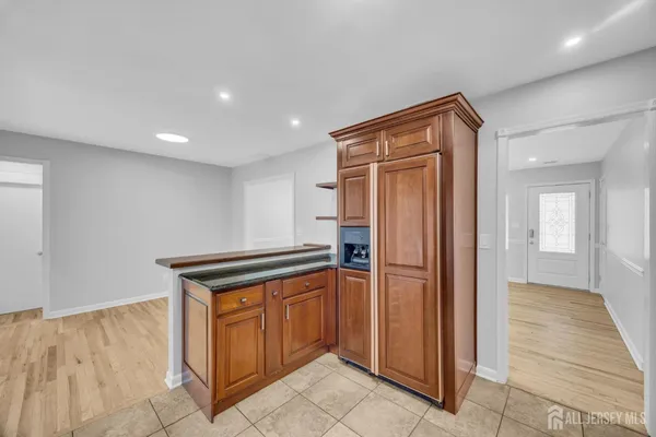 a front view of a house with a yard table and chairs