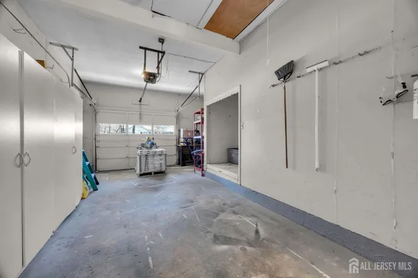 a house with swimming pool in front of it