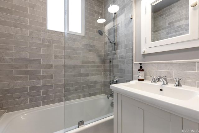 a bathroom with a sink and a bathtub