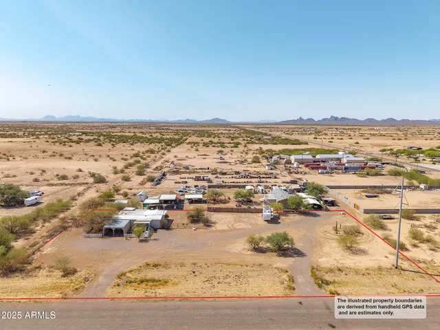 an aerial view of residential building and ocean