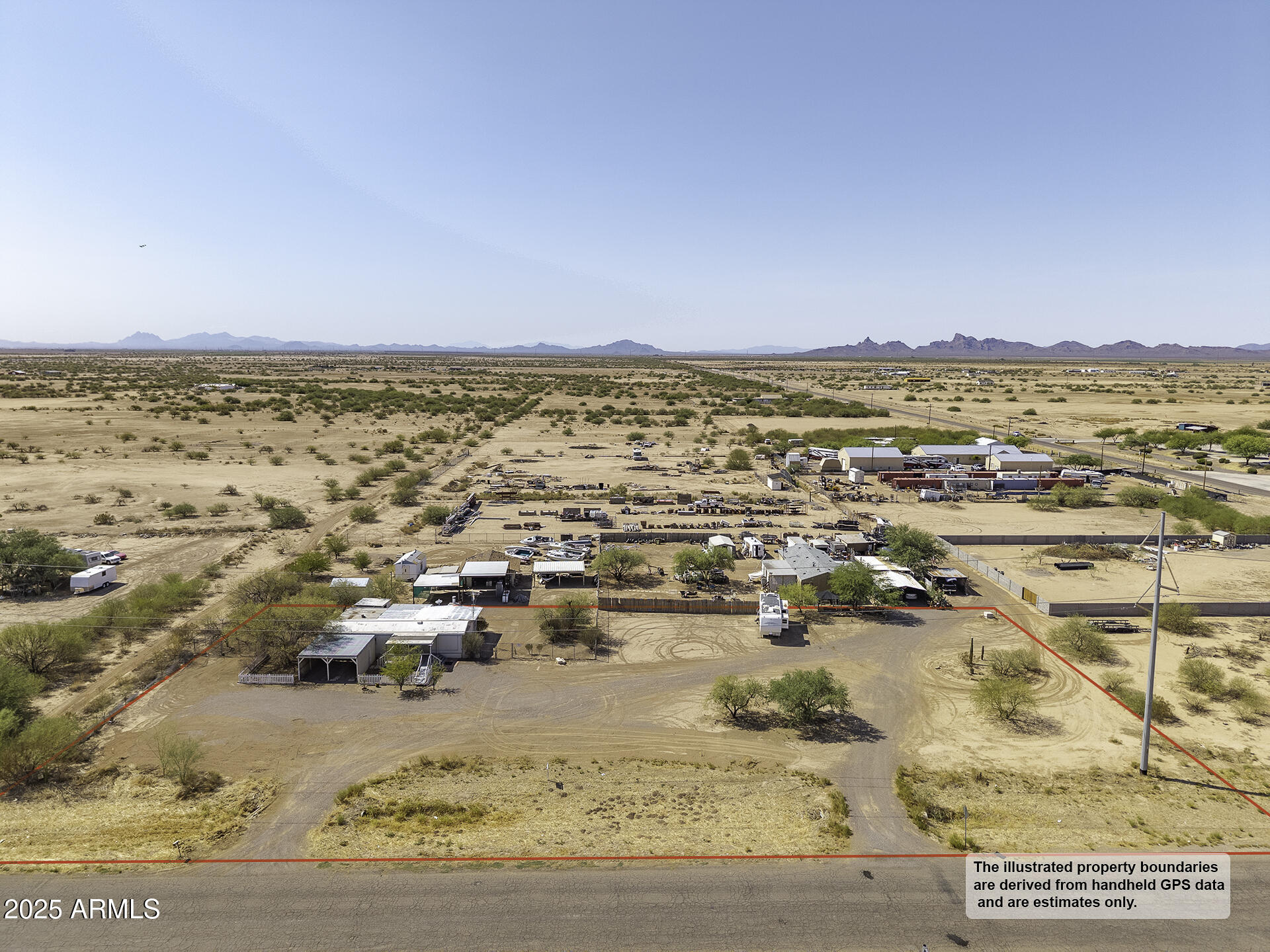 an aerial view of residential building and ocean