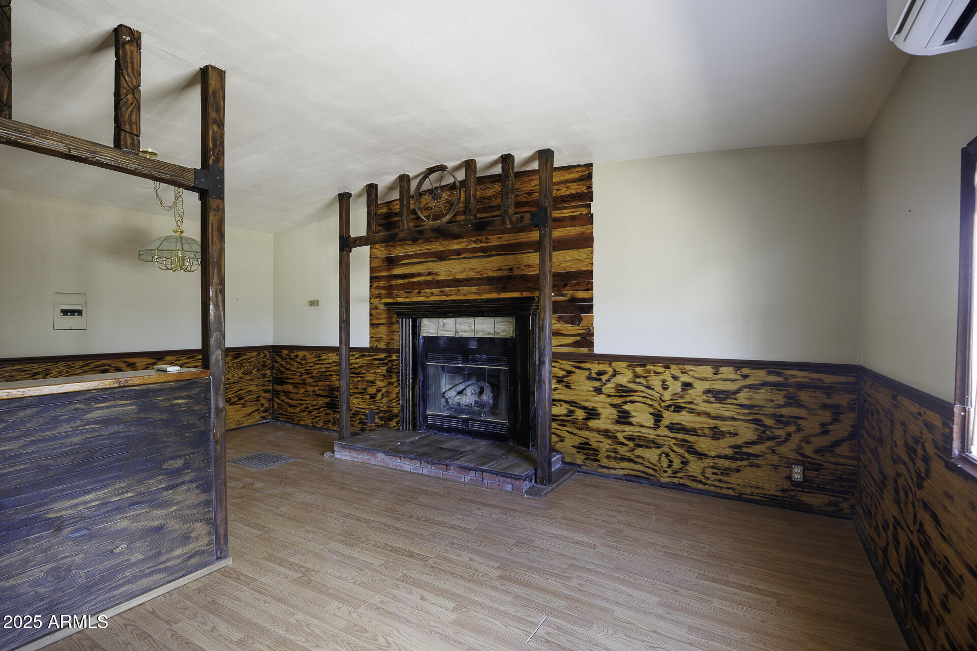9505 West Milligan Road Arizona City, AZ 85123 - Photo 12 of 45 a living room with furniture and a fireplace