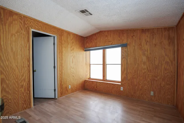 a bathroom with a sink a toilet and shower curtain