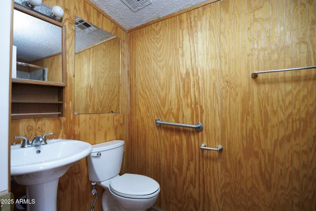 a bathroom with a shower and a tub