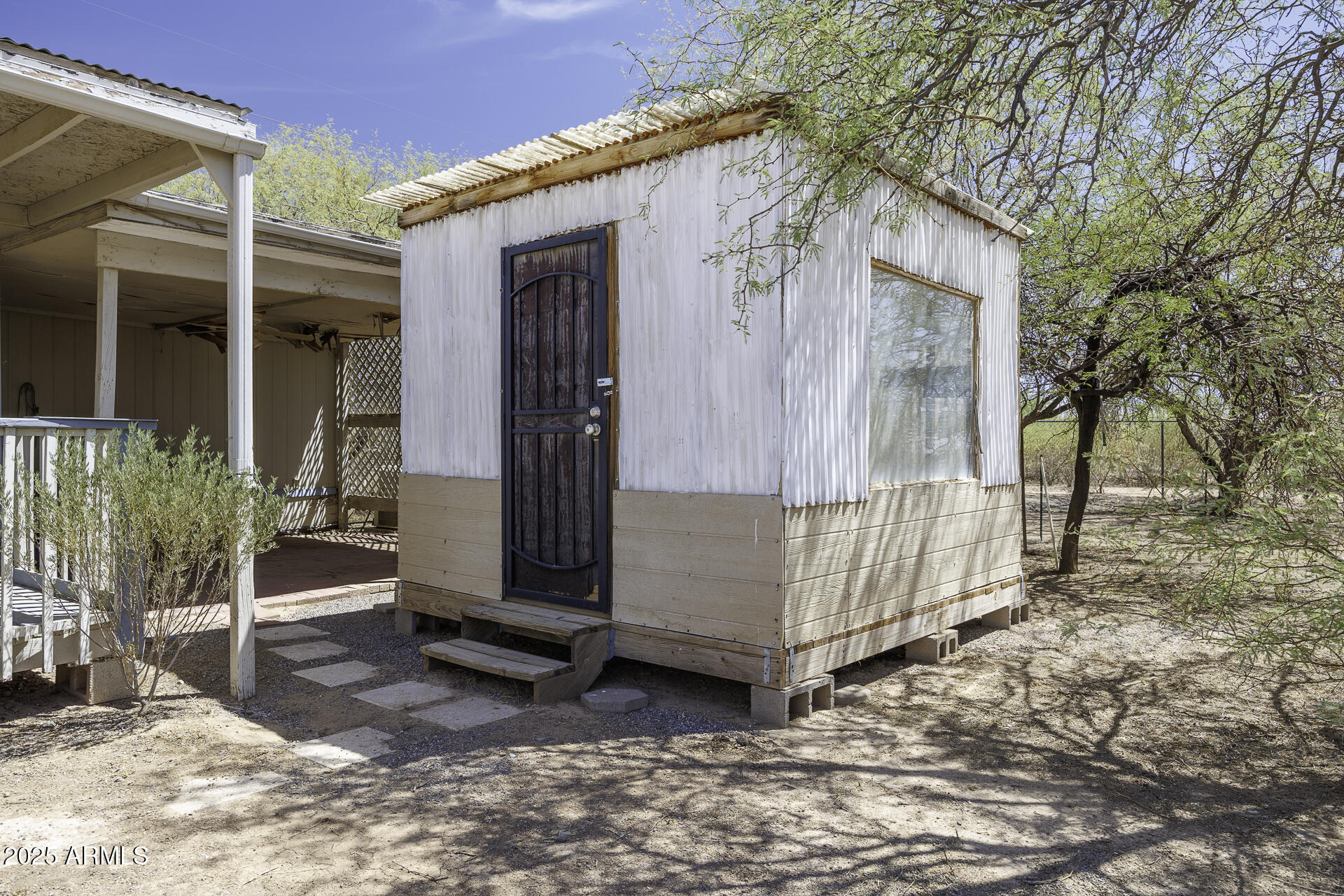 9505 West Milligan Road Arizona City, AZ 85123 - Photo 33 of 45 a view of a house with a yard