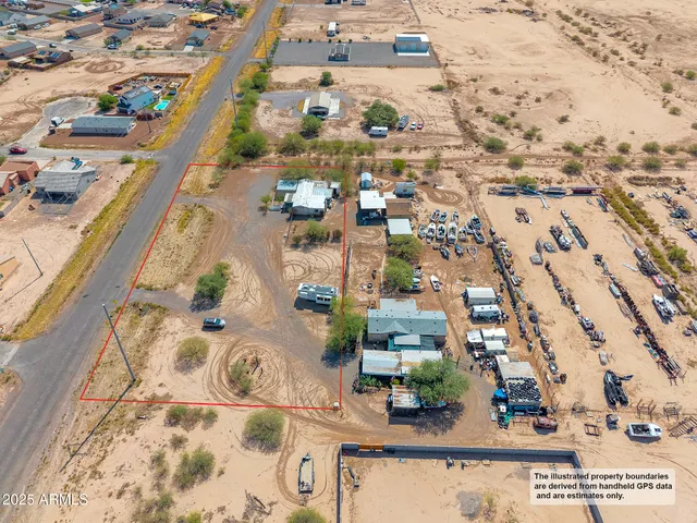 an aerial view of residential building and ocean