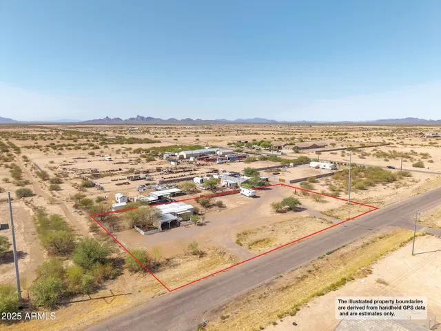 an aerial view of residential building and ocean