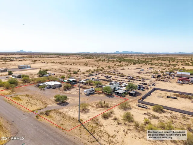 an aerial view of residential building and ocean view