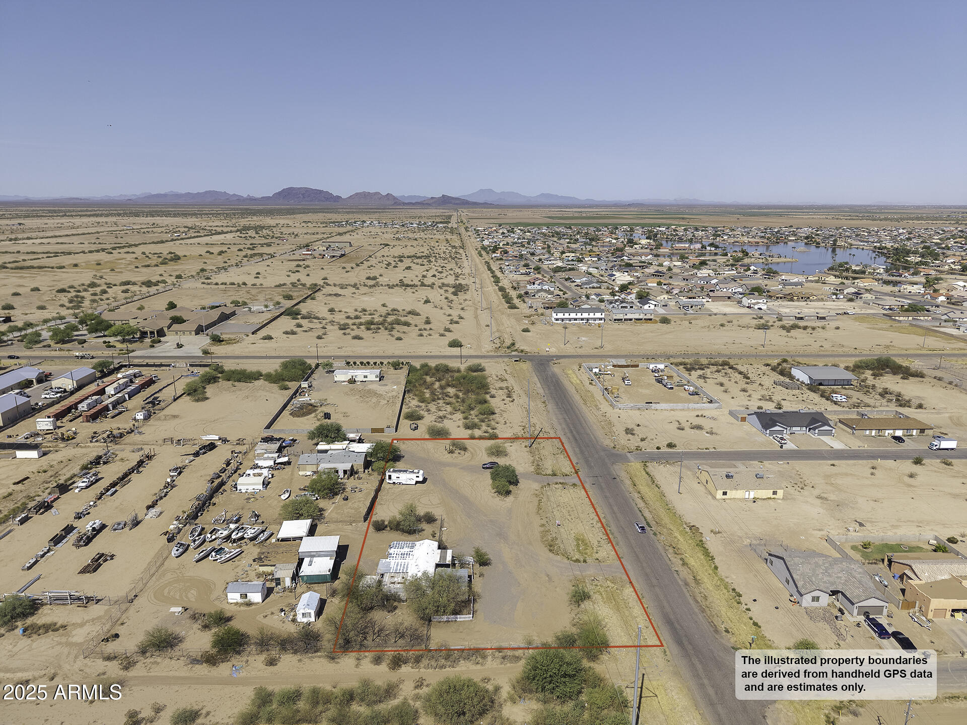 9505 West Milligan Road Arizona City, AZ 85123 - Photo 42 of 45 an aerial view of residential houses with outdoor space