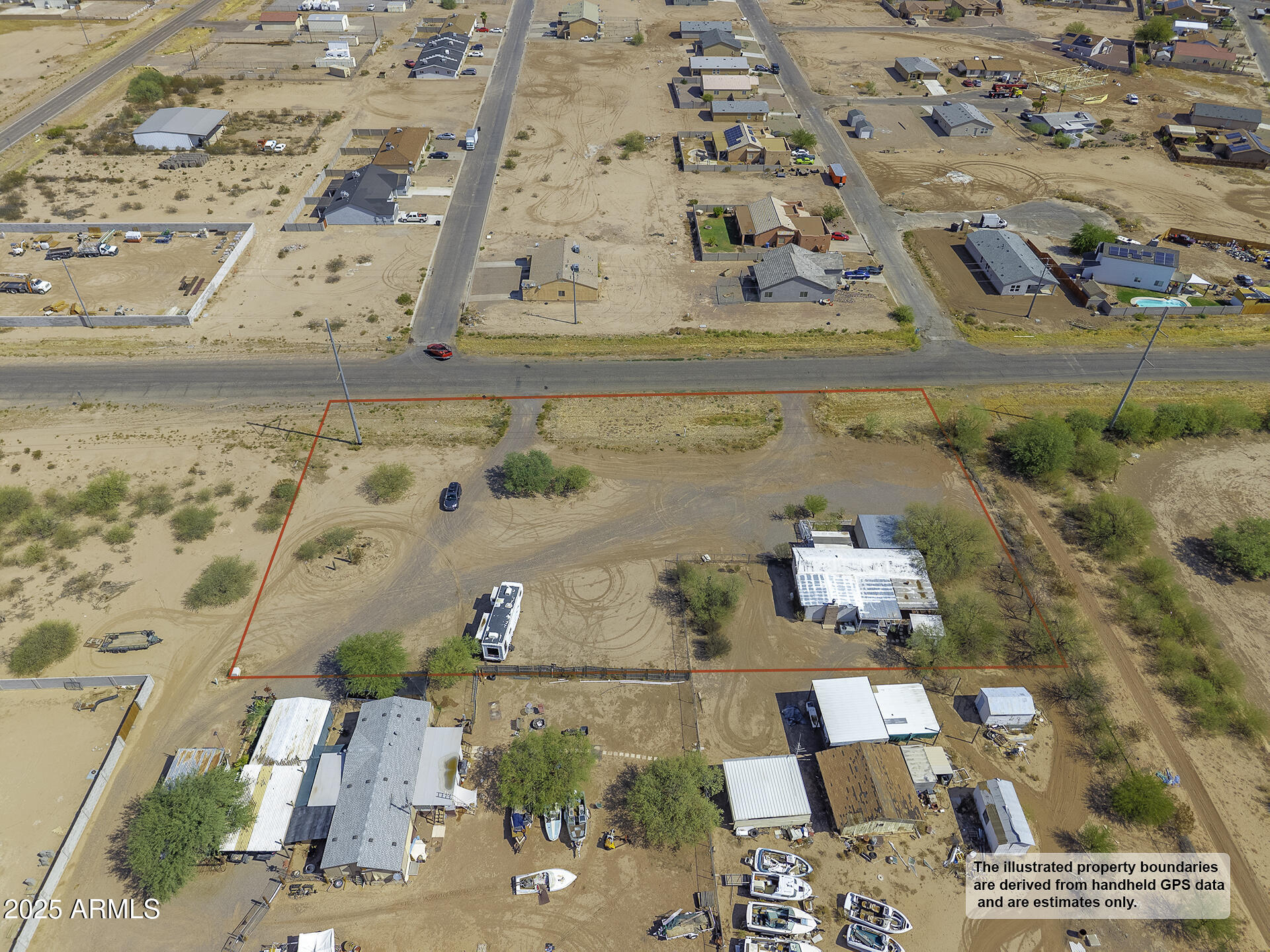 9505 West Milligan Road Arizona City, AZ 85123 - Photo 43 of 45 an aerial view of residential houses with outdoor space
