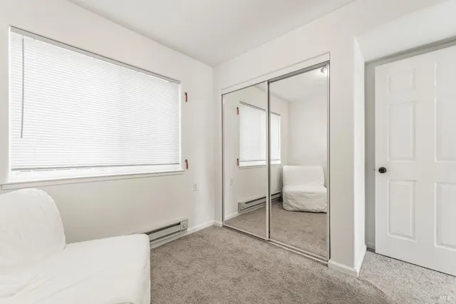 a bathroom with a tub and a shower