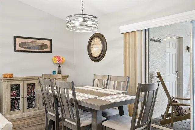 a kitchen with a sink a stove a microwave and cabinets
