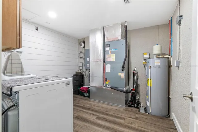 a view of parking garage with cars parked