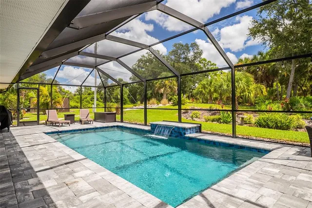 an aerial view of a house with a garden