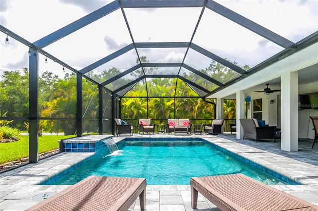 a view of a garden with an outdoor space