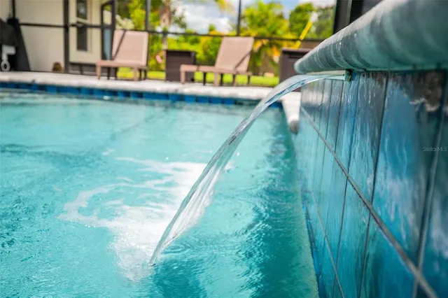 an aerial view of a house with a garden