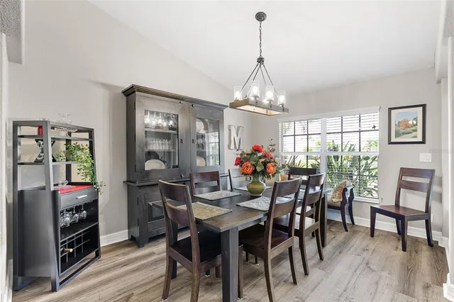 a living room with furniture pool and a table