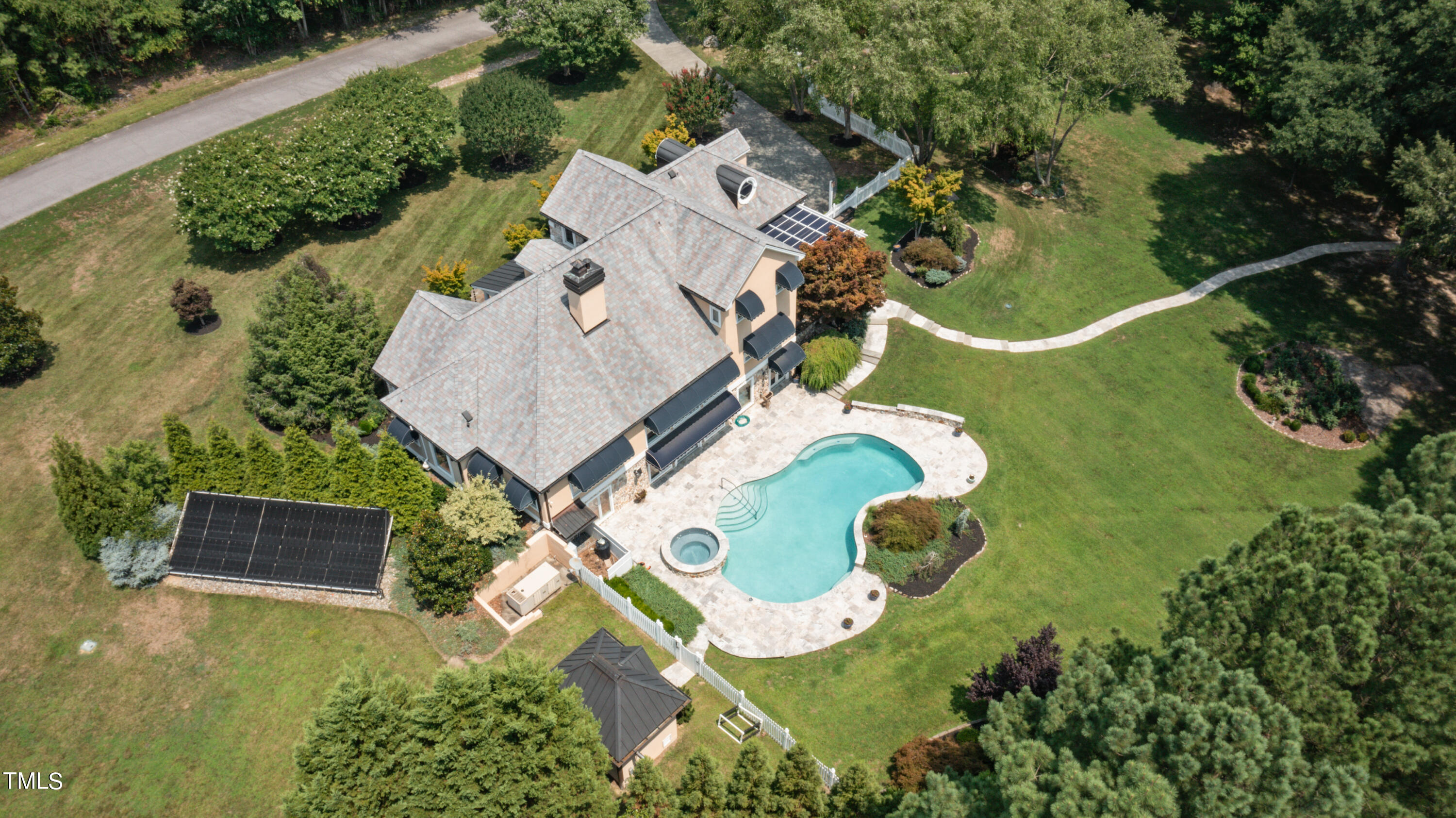 an aerial view of a swimming pool