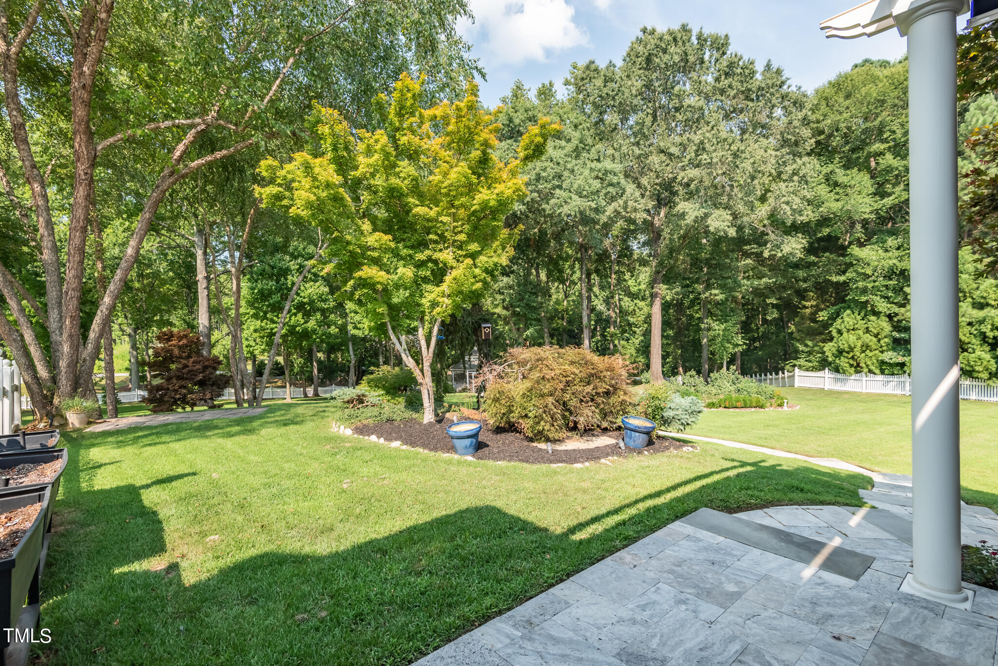 1936 Amethyst Ridge Road Raleigh, NC 27604 - Photo 21 of 74 a view of a backyard with large trees