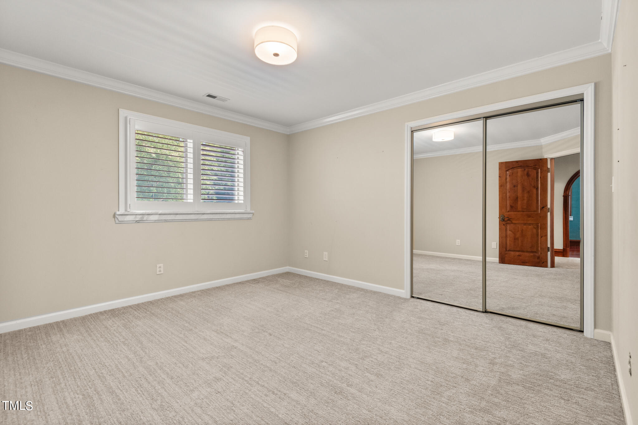 1936 Amethyst Ridge Road Raleigh, NC 27604 - Photo 37 of 74 an empty room with windows and closet