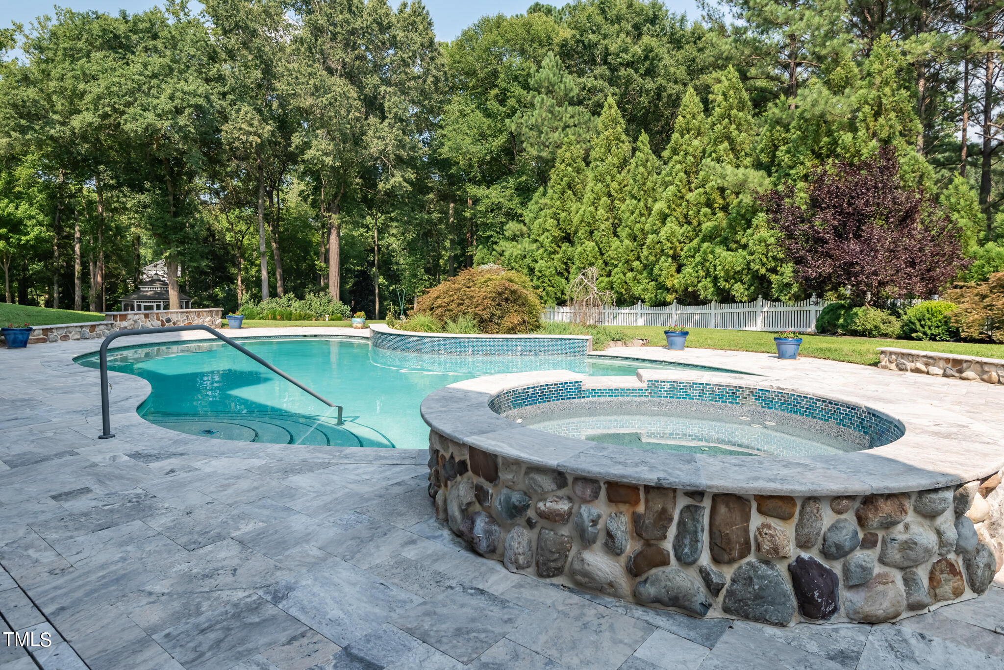 1936 Amethyst Ridge Road Raleigh, NC 27604 - Photo 54 of 74 a view of a swimming pool with a patio